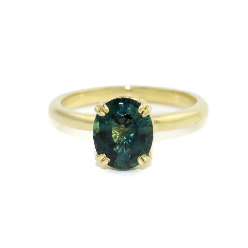 14 KT Gold Teal Sapphire Solitaire Ring