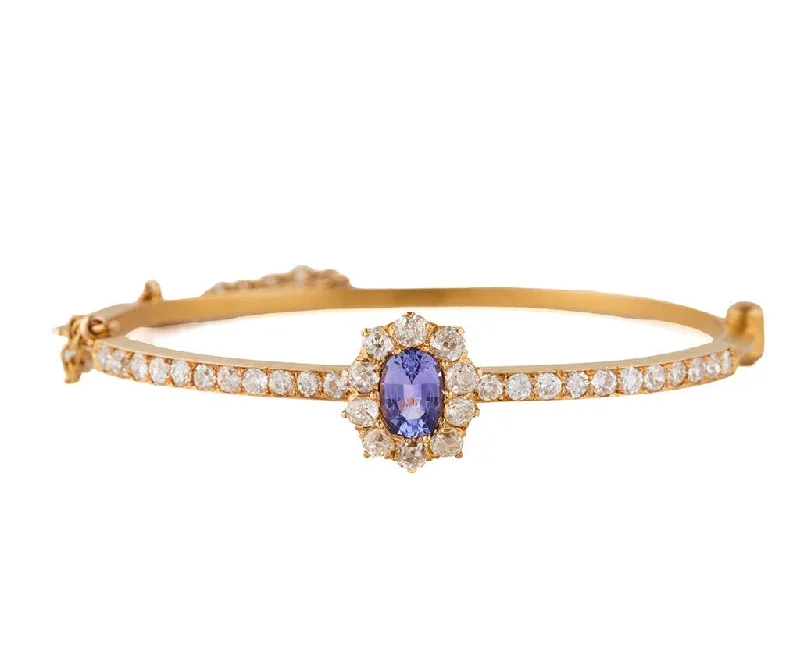 0.85ct Oval Tanzanite and 2.25ctw Diamond Frame Bangle Bracelet in 14K